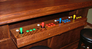 Illustration for article titled Video Game Bar Tackles Two Life-Hindering Addictions at Once